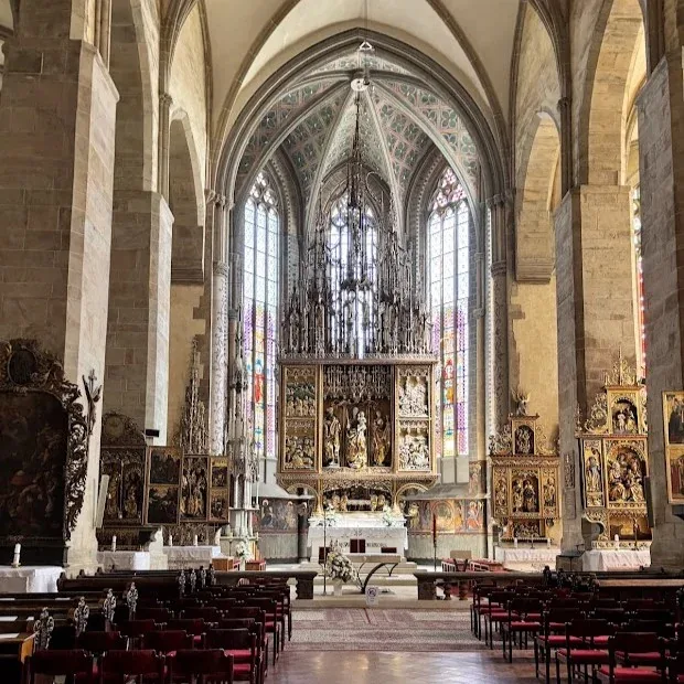 The gilded Gothic high altar carved by Master Pavol in the Basilica of St James in Levoča, the tallest wooden altar in the world, rising into the vault above the nave.